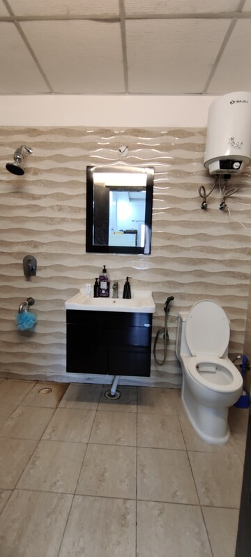 Bathroom in 2 BHK Apartment at Antriksh Golf View, Sector 78 – for Rent