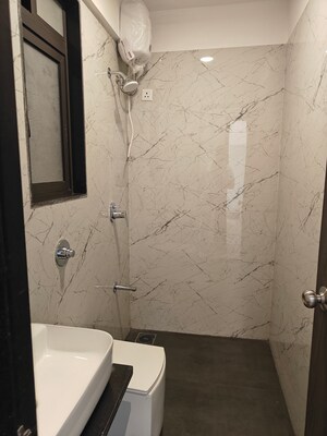 Bathroom in 2 BHK Apartment at Sunbeam Heights, Andheri West – for Sale