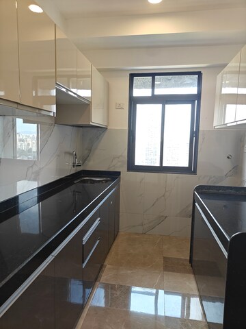 Kitchen in 2 BHK Apartment at Sunbeam Heights, Andheri West – for Sale