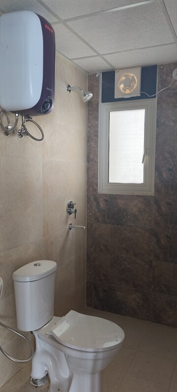 Bathroom in 3 BHK Apartment at Rishita Manhattan, Gomti Nagar – for Rent