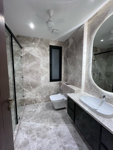 Bathroom in 4 BHK Builder Floor at Ansal Sushant Lok I, Sector 43 – for Rent