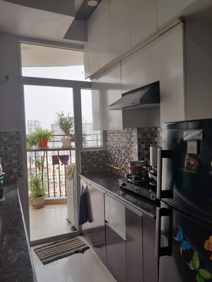 Kitchen in 2 BHK Apartment at Mahagun Mascot, Sain Vihar – for Sale