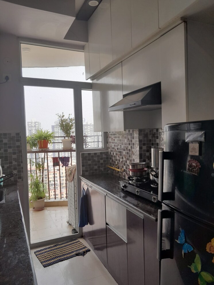 Kitchen, mahagun-mascot 2 Bedroom 1230 Sq.Ft. Apartment In Sain Vihar Ghaziabad 8619780