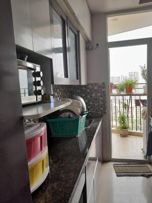 Kitchen in 2 BHK Apartment at Mahagun Mascot, Sain Vihar – for Sale