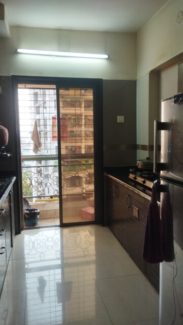 Kitchen in 2 BHK Apartment at Regency Estate, Dombivli East – for Rent