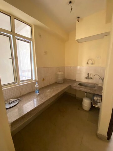 Kitchen in 2 BHK Apartment at Supertech Ecociti, Sector 137 – for Sale