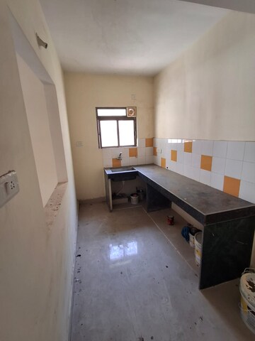Kitchen in 2 BHK Apartment at TATA Housing Aashiana, Mazgaon – for Sale