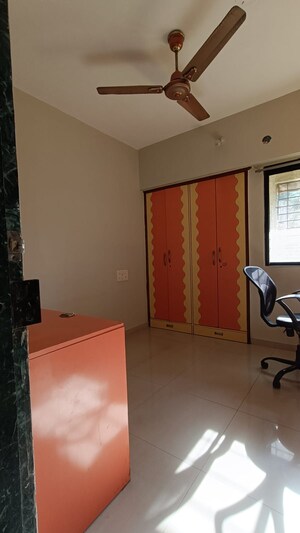 Living Room in 2 BHK Apartment at Parsik Nagar – for Sale