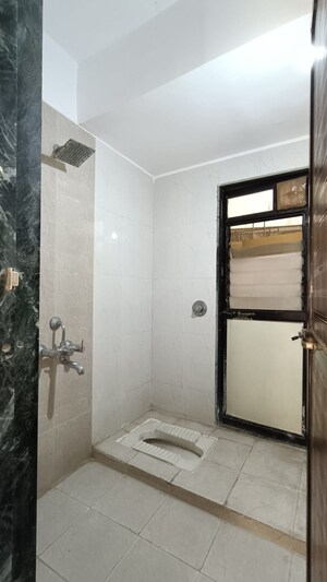 Bathroom in 2 BHK Apartment at Parsik Nagar – for Sale