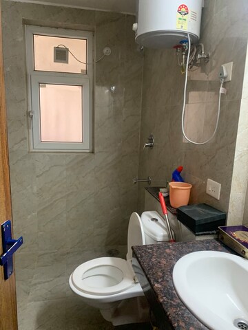 Bathroom in 3 BHK Apartment at Adani Oyster Grande Phase 2, Sector 102 – for Rent