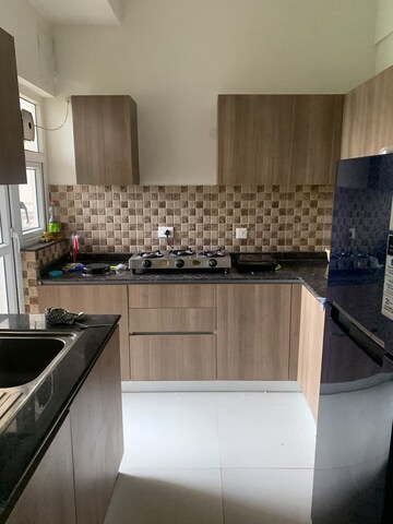 Kitchen in 3 BHK Apartment at Adani Oyster Grande Phase 2, Sector 102 – for Rent