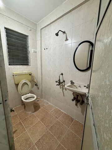 Bathroom in 2 BHK Apartment at Vashi Sector 14 – for Sale