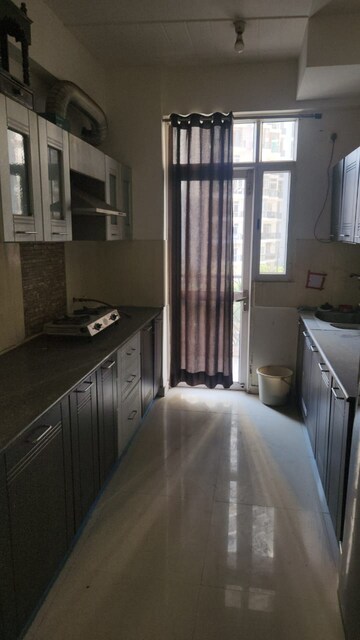 Kitchen in 3 BHK Apartment at Prateek Wisteria, Sector 77 – for Rent