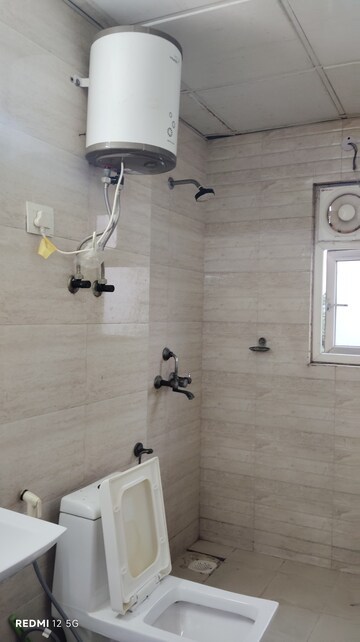 Bathroom in Studio Apartment at Ajnara Daffodil, Sector 137 – for Rent