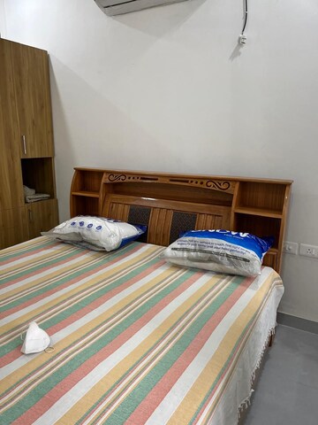 Bedroom in Studio Apartment at DAH Greentech NX Corporate Suites, Tech Zone 4 Greater Noida – for Rent