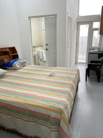 Bedroom in Studio Apartment at DAH Greentech NX Corporate Suites, Tech Zone 4 Greater Noida – for Rent