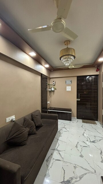 Living Room in 2 BHK Apartment at Hubtown Palmrose, Andheri East – for Rent