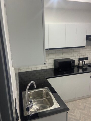 Kitchen in 1 BHK Apartment at DLF Building 10, Dlf Phase ii – for Rent