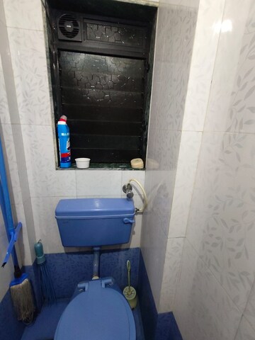 Bathroom in 1 BHK Apartment at Himgiri Lokupvan Phase II CHS Ltd, Vasant Vihar – for Sale