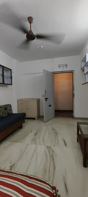 Living Room in 1 BHK Apartment at Navyug CHS Santacruz East, Santacruz East – for Sale