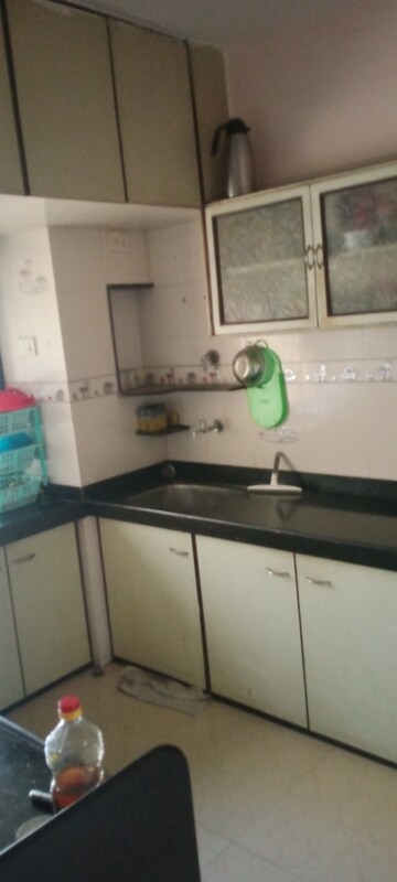 Kitchen in 2 BHK Apartment at Takshila CHS, Andheri East – for Rent