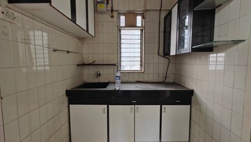 Kitchen in 1 RK Apartment at Krupa Alaknanda A, Borivali West – for Rent