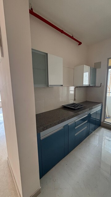 Kitchen in 2 BHK Apartment at Piramal Vaikunth, Balkum Pada – for Rent