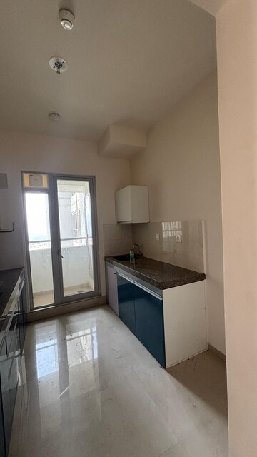 Kitchen in 2 BHK Apartment at Piramal Vaikunth, Balkum Pada – for Rent