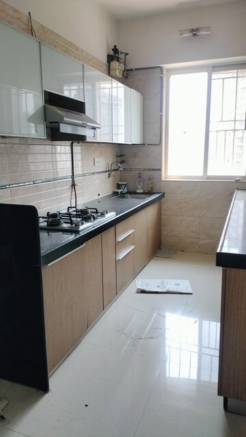Kitchen in 2 BHK Apartment at Dignity CHS, Wadala – for Rent