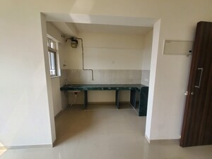 Kitchen in 2 BHK Apartment at Kalyan West – for Sale