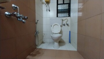 Bathroom in 2 BHK Apartment at Satellite Garden, Goregaon East – for Rent