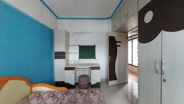 Living Room in 2 BHK Apartment at Satellite Garden, Goregaon East – for Rent