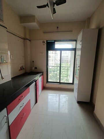 Kitchen in 1 BHK Apartment at Shree Ostwal Orchid, Mira Road – for Sale