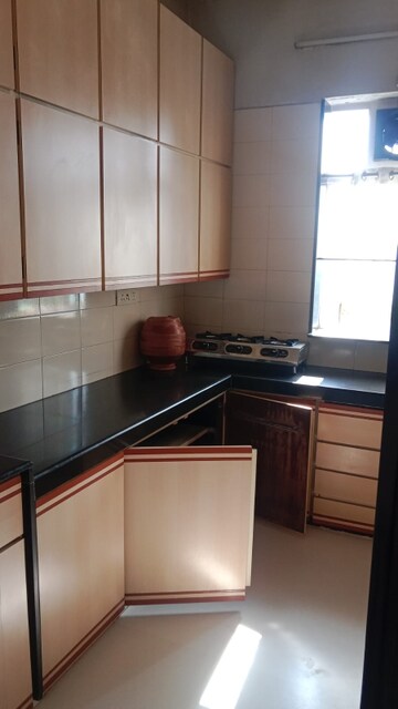 Kitchen in 2 BHK Apartment at Runwal Nirvana, Parel – for Rent