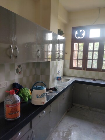 Kitchen in 2.5 BHK Apartment at Drosia Apartments, Aliganj – for Rent