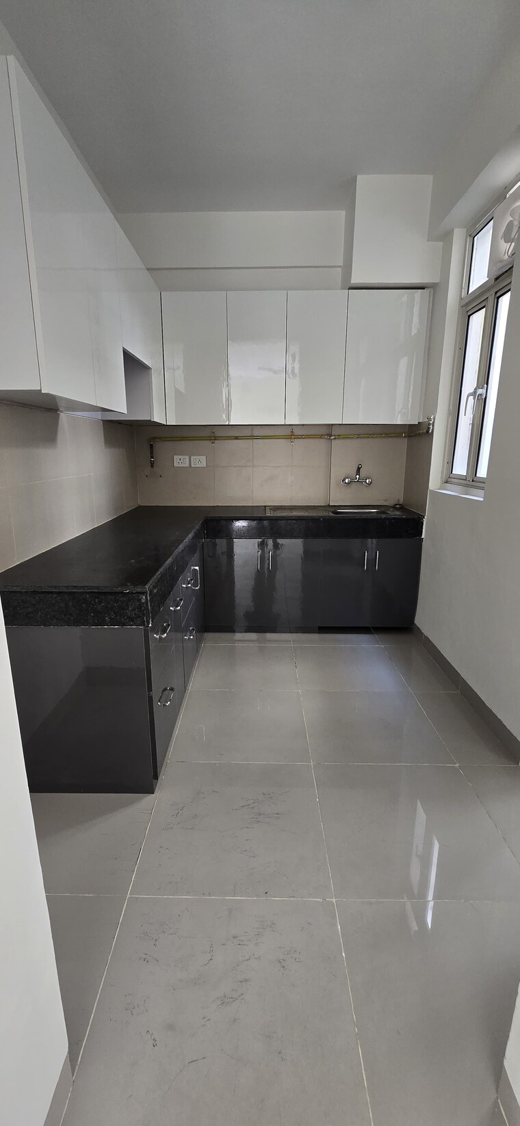 Kitchen, wave-executive-floors 2 Bedroom 900 Sq.Ft. Apartment In Wave City Ghaziabad 8623256