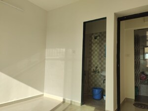 Master Bedroom in 1.5 BHK Apartment at Man Opus, Mira Road – for Sale