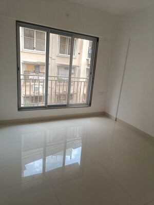 Bedroom in 2 BHK Apartment at Samarpan Hiranmay Niwas CHS, Borivali East – for Sale