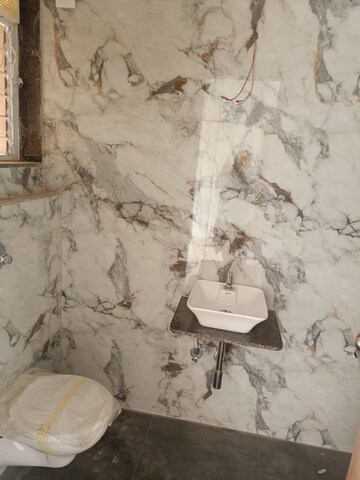 Bathroom in 2 BHK Apartment at Samarpan Hiranmay Niwas CHS, Borivali East – for Sale