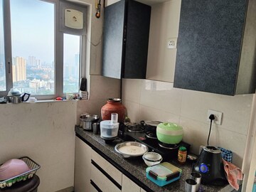 Kitchen in 2 BHK Apartment at Piramal Vaikunth, Balkum Pada – for Rent
