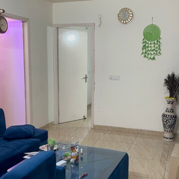 Living Room in 2 BHK Apartment at Gaur Atulyam, Omicron I Greater Noida – for Rent
