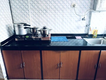 Kitchen in 1 BHK Apartment at Highland Residency CHSL, Balkum Pada – for Rent