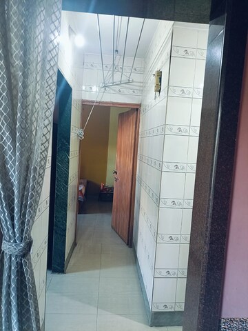 Building Lobby in 1 BHK Apartment at Highland Residency CHSL, Balkum Pada – for Rent