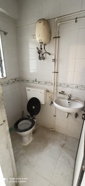 Bathroom in 1 BHK Apartment at Ajanta Heights, Naigaon East – for Rent
