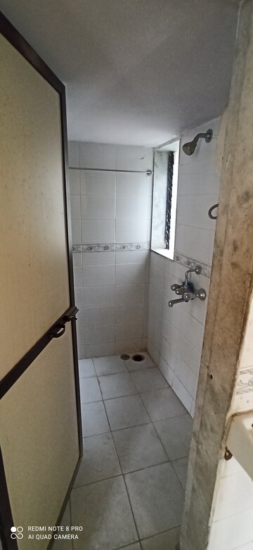 Bathroom in 1 BHK Apartment at Ajanta Heights, Naigaon East – for Rent