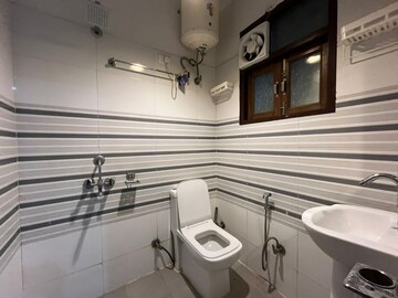 Bathroom in 1 BHK Builder Floor at Freedom Fighters Enclave – for Rent