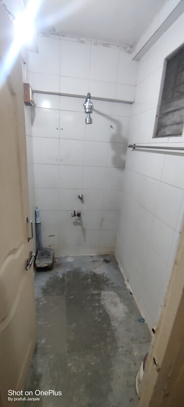 Bathroom in 1 BHK Apartment at Nisarg CHS, Gokhalenagar – for Rent