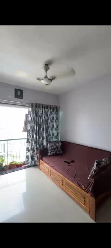 Living Room in 1.5 BHK Apartment at Man Opus, Mira Road – for Sale