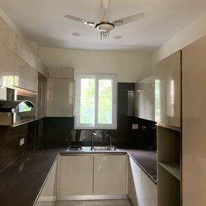 Kitchen in 4 BHK Builder Floor at Ansal API Esencia, Sector 67 – for Sale