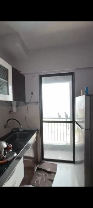 Kitchen in 1.5 BHK Apartment at Man Opus, Mira Road – for Sale